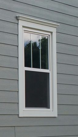 Vinyl windows cottage style with fams head crown JH trim